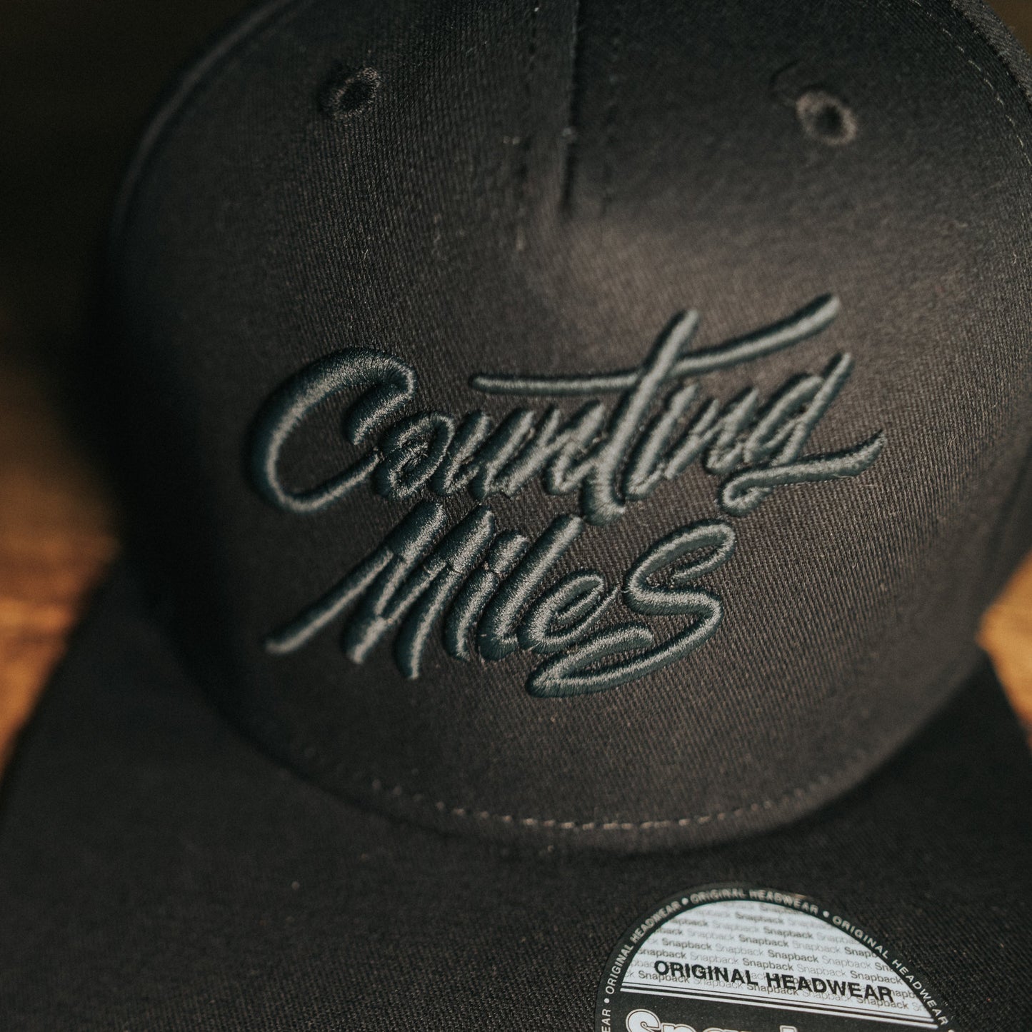 All Black Snapback